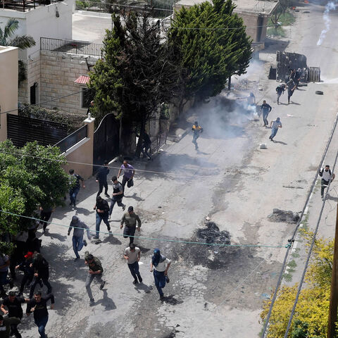 Bullet-ridden buildings are seen at the Ain el-Hilweh camp following the latest flare-up in the Palestinian refugee camp, Sidon, Lebanon, Aug. 4, 2023.